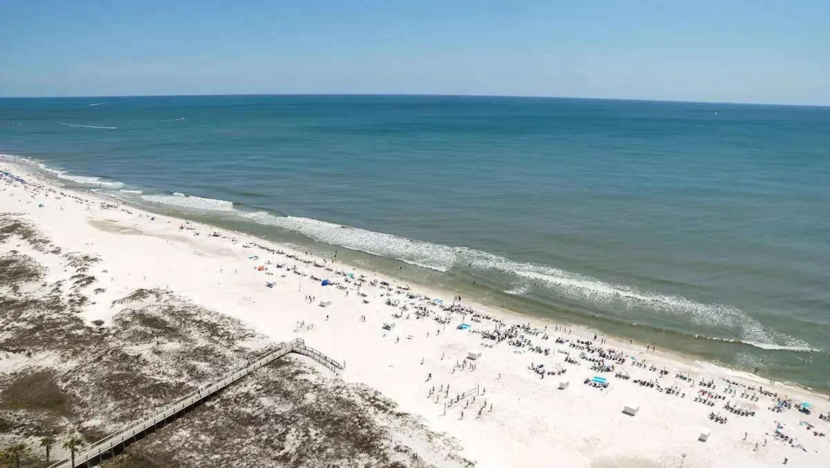 A bird's eye view of the beautiful white sand beaches that line the Gulf of America. A coastal paradise!